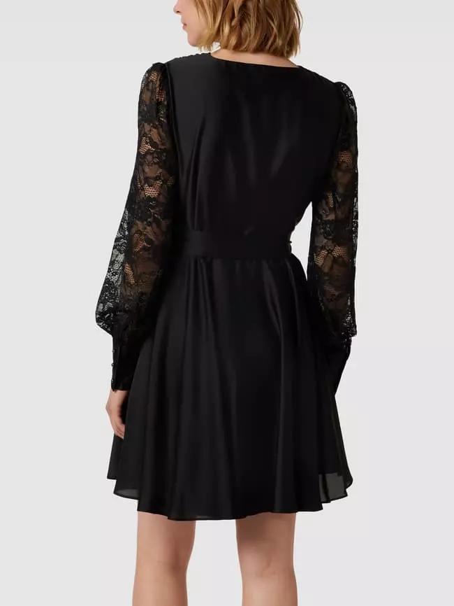 Swing Knielanges Kleid Mit Taillengürtel - Schwarz 7 Swing Knielanges Kleid Mit Taillengürtel - Schwarz – Bild 5